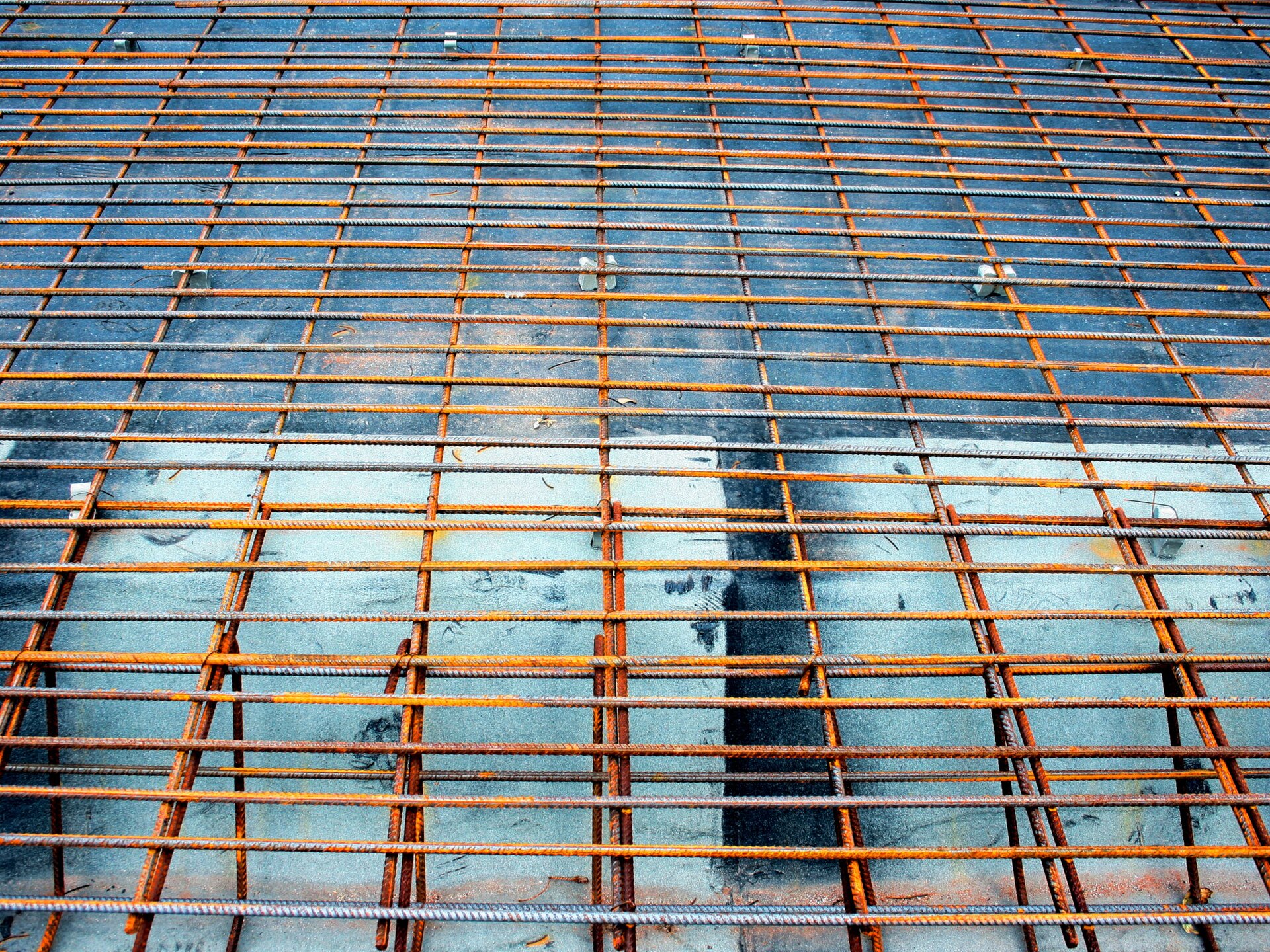 Steel bars laid for a concrete slab, ready for cover blocks and concrete
