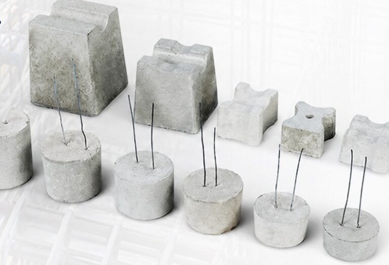Concrete cover blocks by PM Spacers in different sizes, many with binding wire